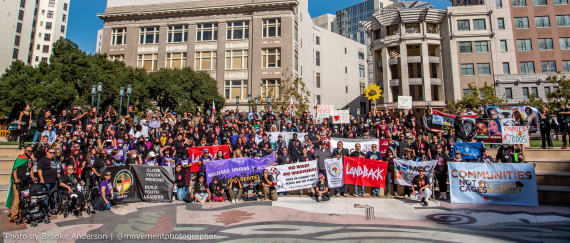 Group photo of Membership Assembly participants in Oscar Grant Plaza in Oakland, CA